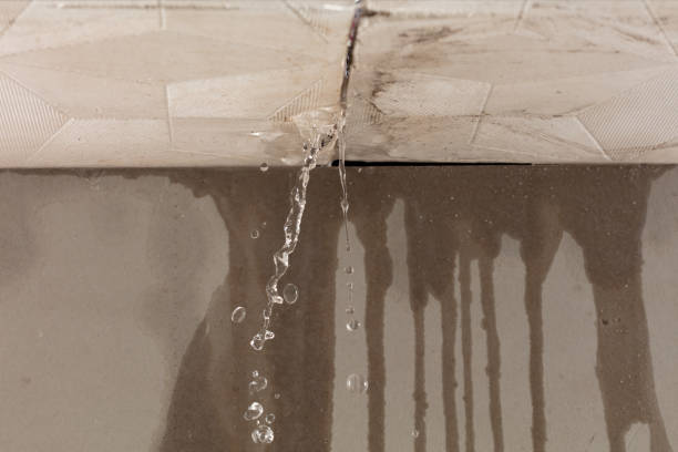 Professional Flood Damage Cleanup technician working in Alfred, ME